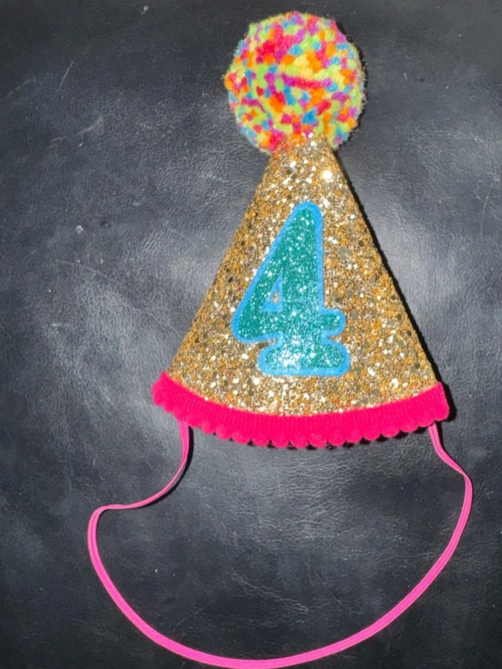 Like new, girls 4th birthday party cone hat